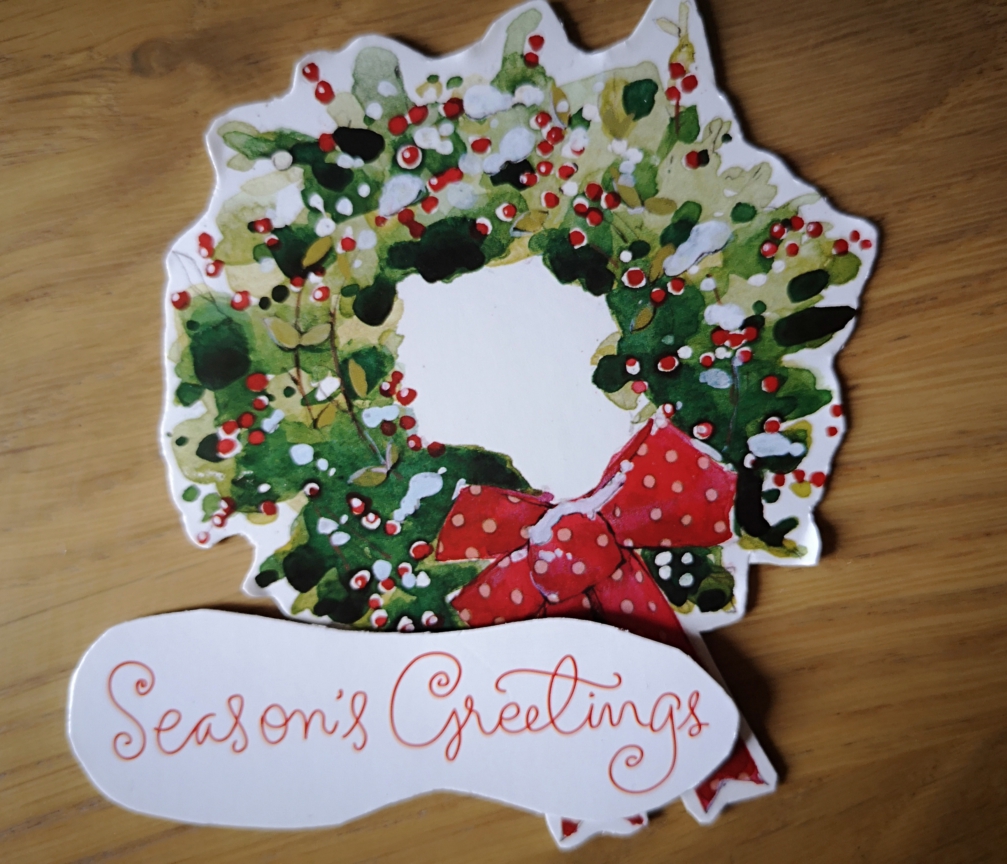 Repurposed greetings card makes two cut-outs